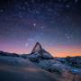 mountain_peak_stars_sky_night_light_snow_46057_1920x1200.jpg